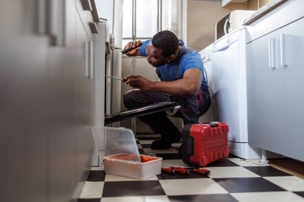 Skilled residential handyman performing plumbing and carpentry services in Simei