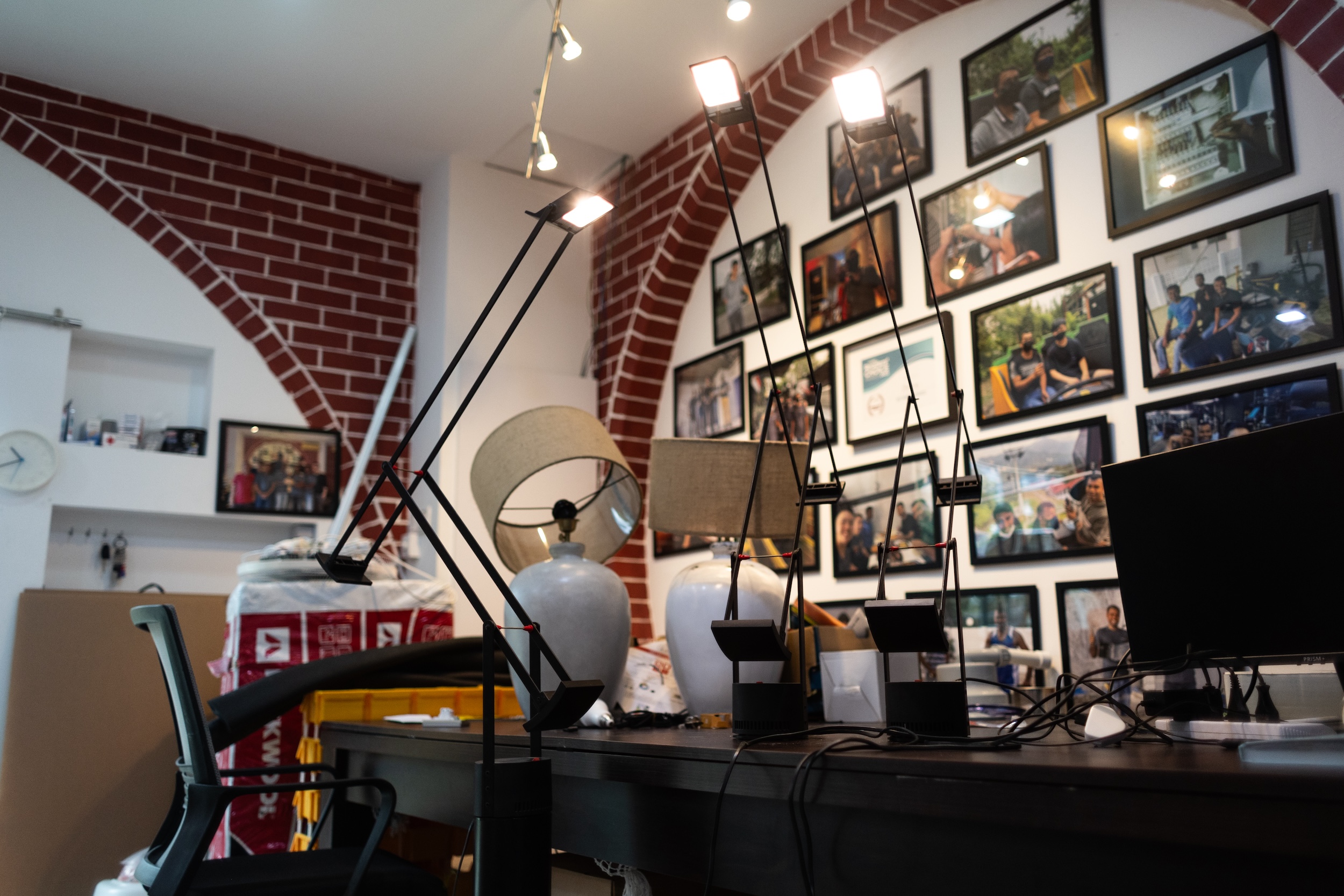 Handyman performing electrical fixture replacement safely in home setting interior