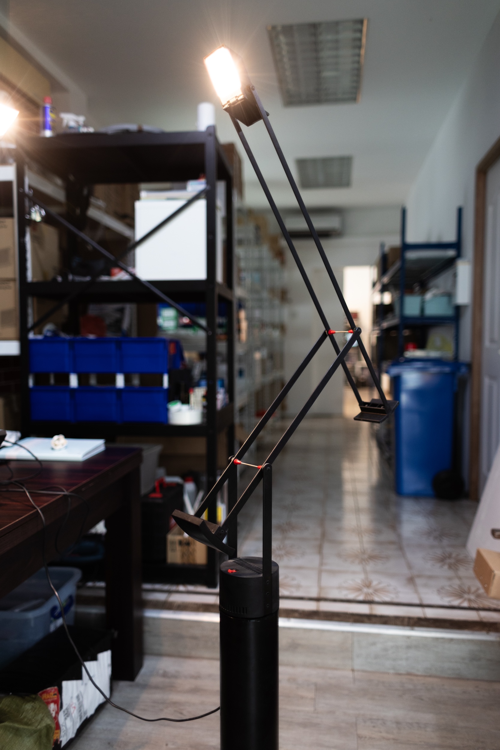 Repair.sg technician fixing wall mounted shelf securely indoors residential space
